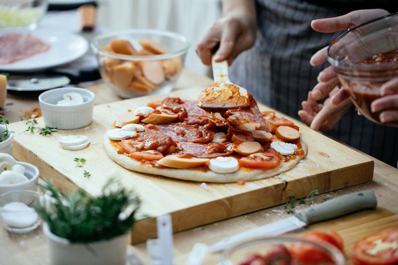Build your own pizza with fresh toppings ready to be assembled