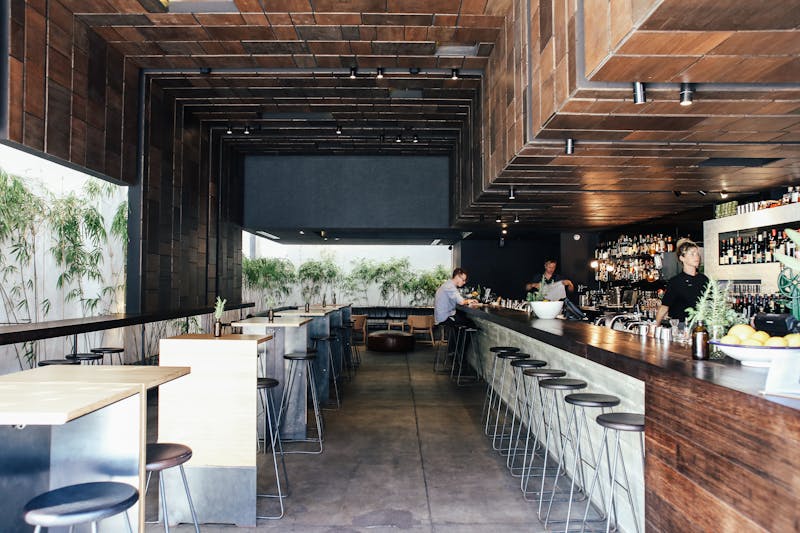 Mod Pizza franchise restaurant interior with customers dining